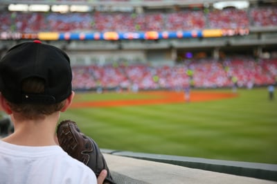 bigstock-Young-baseball-fan-watches-the-26247812