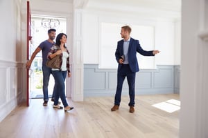 bigstock-Realtor-Showing-Hispanic-Coupl-124995113