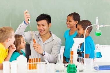bigstock-primary-school-science-teacher-resized